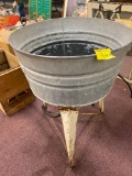 Galvanized bucket with legs