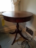 Mahogany drum table with drawer and splayed legs