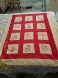 Hand stitched youth quilt with animals and people