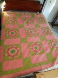 Handmade star pattern quilt, shows wear