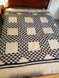 Handmade quilt with triangle pattern