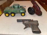 Tootsie toy tank, hard rubber cannon (damaged), Swallow tin cap gun.