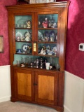 Antique corner cupboard, 82