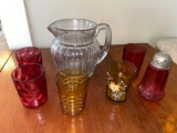Hersey pitcher, cranberry glass shaker, (5) art glass tumblers.