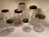 (7) Tin lid store jars.