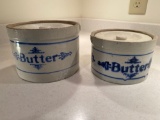 Two butter stoneware crocks.
