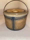 Stoneware jar w/ lid & wire handle.