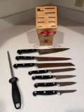 8-Pc. Zwilling Henckels Solingen Germany professional knife set w/ wood block holder.