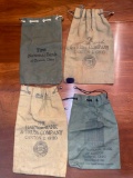 First National & Harter Bank money bags.