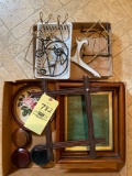 Old picture frames, plate holders, wooden figurine bases.