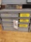 Metal organizer with assorted fuses and bolt stock