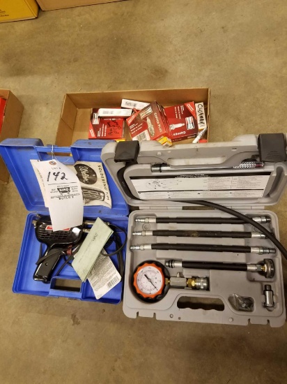 Solder gun, compression tester, spark plugs