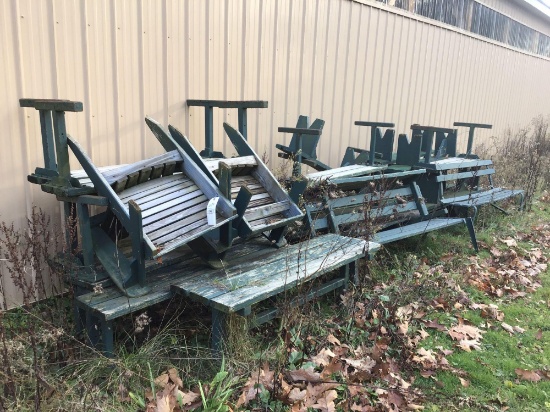 Assorted outdoor chairs and benches.