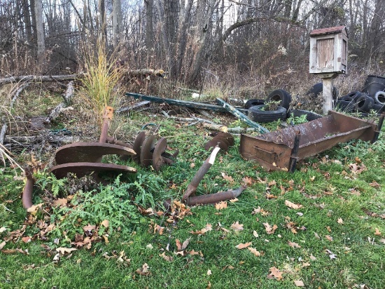 Auger, parts, scrap iron and tires.