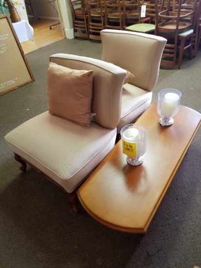 2 matching upholstered chairs, coffee table and candle holders