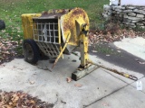 Portable cement mixer. With Wisconsin engine