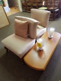 2 matching upholstered chairs, coffee table and candle holders