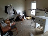 Contents of room, ironrite mangle iron, chairs, clothes rack with uniforms