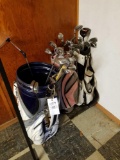 Lady Hagan, Puma, Tommy Arwour golf bags with assorted clubs