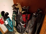 7 golf bags with assorted mixed clubs