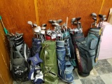 Assorted golf bags, clubs, Callaway bag