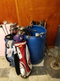 3 golf bags and assorted loose clubs