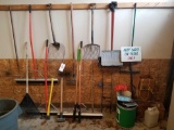 Squeegee, fork, sign stakes, sledge, axe, assorted yard tools