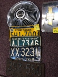 Old license plates, mustang hubcap,Chevy