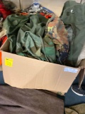 Box full of military uniforms, clothes, bags