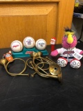 Cleveland Indians baseballs and stuffed animal, horns, Santa Pez, Home Depot at work