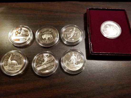 Unc. commemorative half dollars, bid x 7