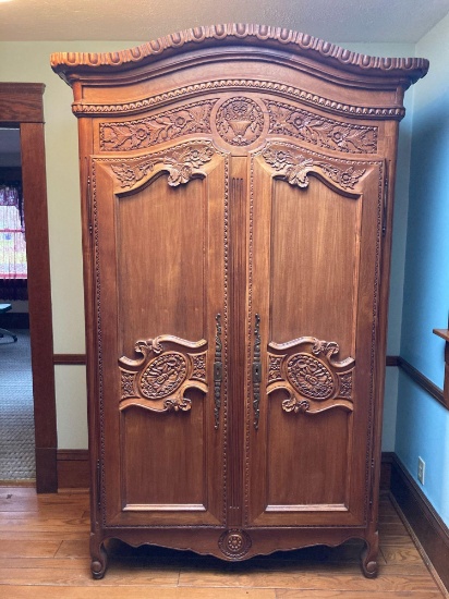 Antique hand carved knock down 2-door armoire