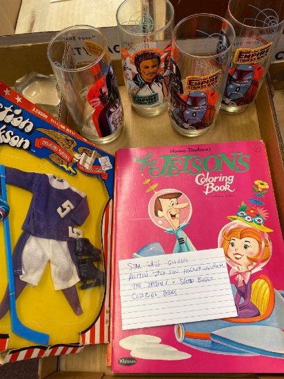 Star Wars glasses, action Jackson hockey uniform, the Jetsons and Speed Buggy coloring books