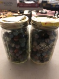 2 jars vintage marbles