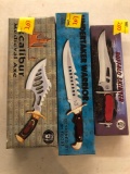 3 knives in boxes