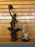 Plastic skeleton and art nouveau man astride eagle Newell post lamp