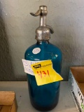 Blue glass seltzer bottle