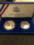 1986 liberty silver dollar and half dollar coins