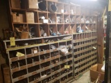 Wall of cast iron fittings, assorted hardware