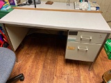 Metal desk, small round table, 2 office chairs, stool, radio, metal cabinet