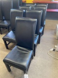 7 black leather like dining chairs