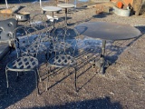 Heavy cast iron pedestal table with 5 chairs