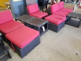 Modern wicker patio set with loveseat, 2 chairs with ottomans, and 3 tables