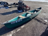 Pelican plastic canoe approximately 14 feet long