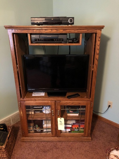 Emerson 32" TV, DVD and VHS Player, Entertainment Cabinet with Tapes, Books