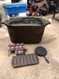 Copper boiler, cast skillet, spice rack