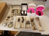 Pocket watches, silverplate flatware, wrist watches, foreign currency and coin dresser box