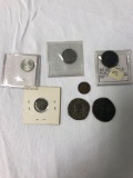 Coins including 1890 US dime, 1883 US coin, Spain coin circa 50 BC