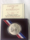 1996 silver one dollar coin from the Atlanta Olympic Games