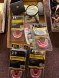 Under Armour mouth guards, magnifying glass, etc